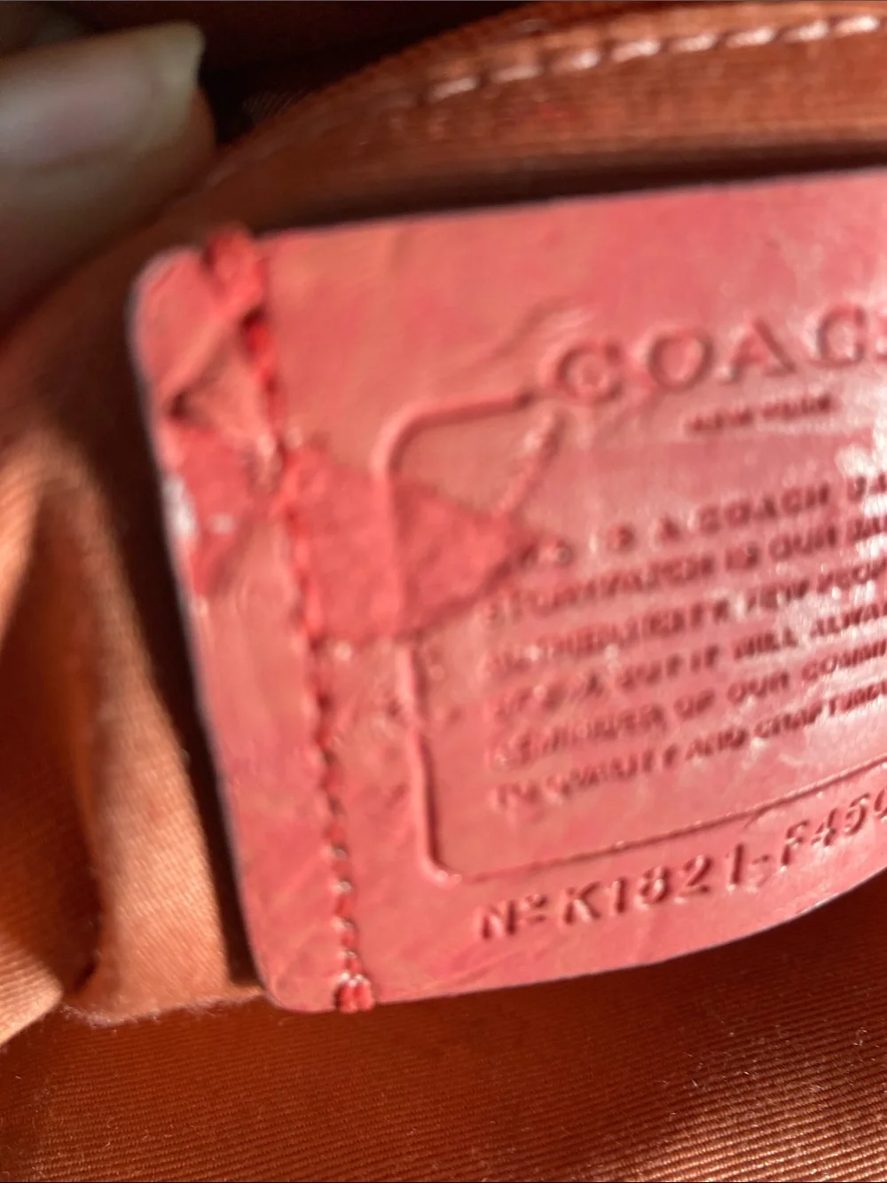 Coach Orange Pebbled Leather Mini Backpack
